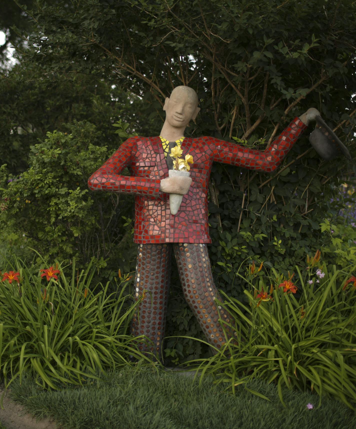 The entrance to Wouterina de Raad's garden last summer. ] JEFF WHEELER &#xef; jeff.wheeler@startribune.com Artist Wouterina de Raad's garden is a showcase for her concrete mosaic sculptures on her farm in Beldenville, WI. Her gardens were photographed Tuesday, July 29, 2014.