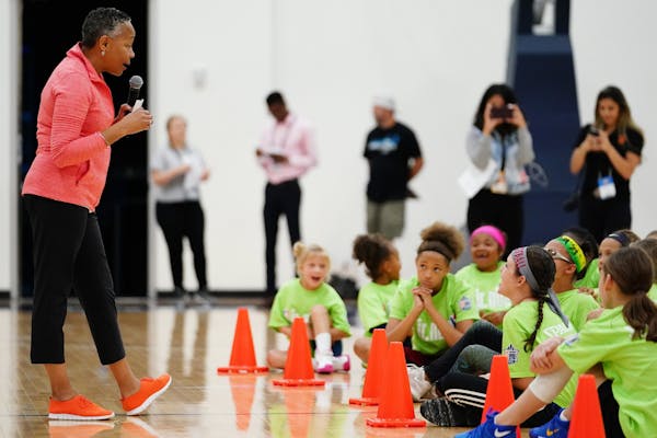 WNBA league president Lisa Michelle Borders talked with participants at the start of the clinic.