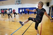 Anne Tudor, 75, leads a popular fitness class for older people at the Ridgedale YMCA in Minnetonka. Her classes draw more participants than any other 