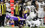 Minnesota Vikings wide receiver Adam Thielen (19) fumble on a pass reception which was recovered by the New Orleans Saints in the first half of an NFL