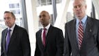 Former Minneapolis police officer Mohamed Noor, center, arrived for the first day of jury selection with his attorney's Peter Wold, left, and Thomas P
