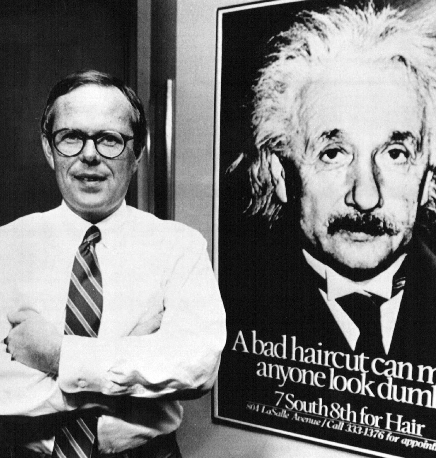 July 11, 1986 Ad World Hit - Pat Fallon of Fallon McElligott Advertising agency stands next to one of the ad posters featuring Albert Einstein which was promoting a hair salon. The agency is now the second largest in the Twin Cities and has won numerous national awards. Larry Salzman, AP Laserphoto ORG XMIT: MIN2015111412325116