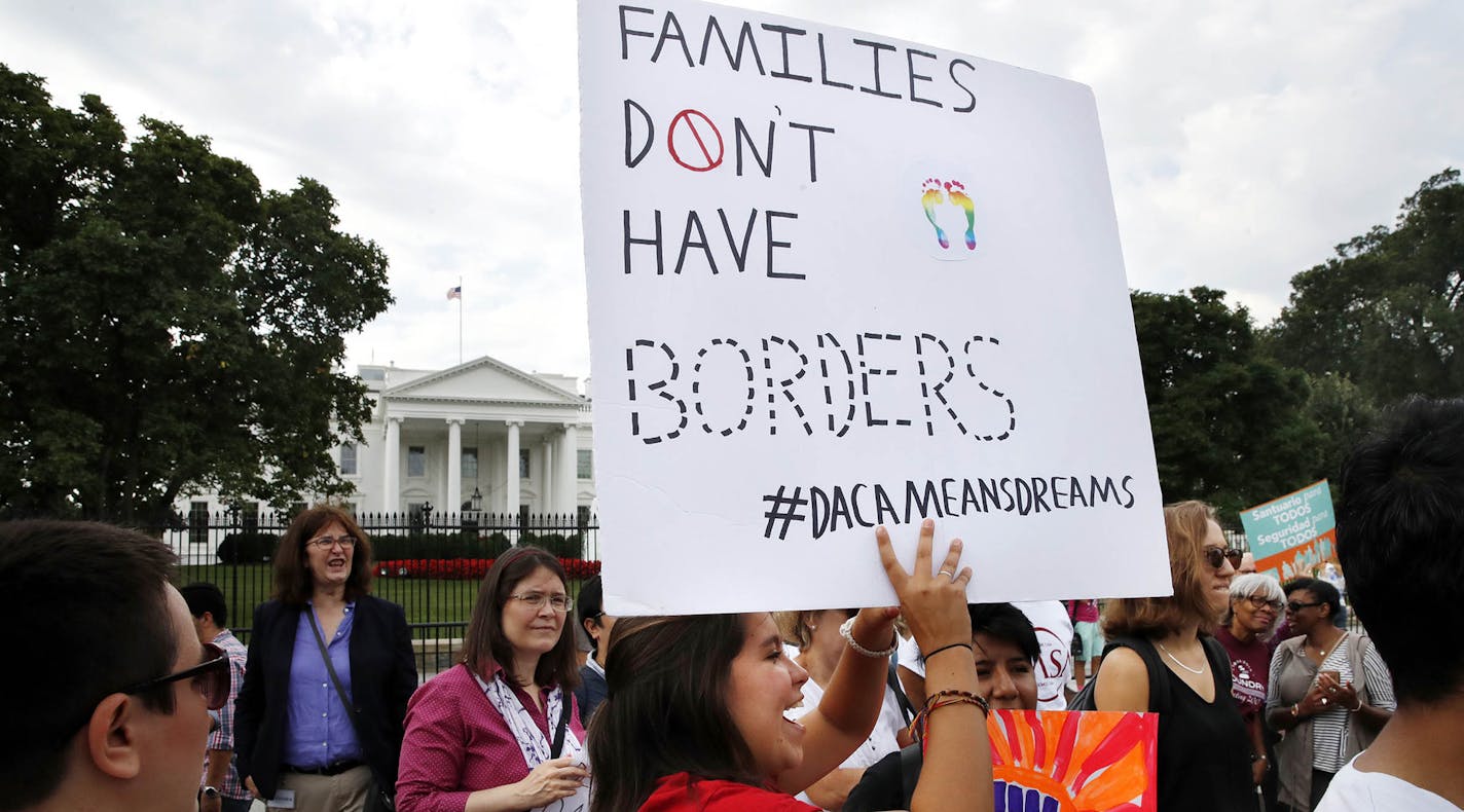 Juliana Torres, 16, center, of Baltimore, rallies in support of Deferred Action for Childhood Arrivals, known as DACA, outside of the White House, in Washington, Tuesday, Sept. 5, 2017.