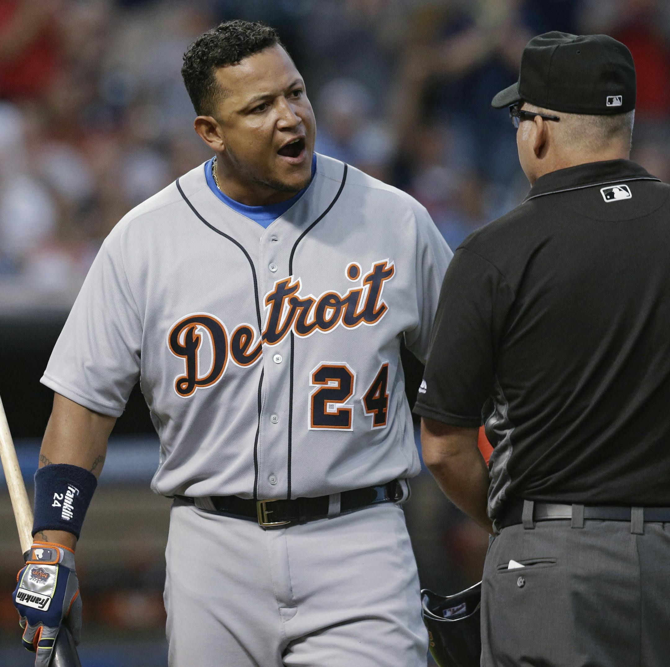 Detroit Tigers' Miguel Cabrera argues a call with first base umpire Tim Timmons during the sixth inning of a baseball game against the Cleveland Indians, Tuesday, July 5, 2016, in Cleveland. Cabrera was out on the play. (AP Photo/Tony Dejak)