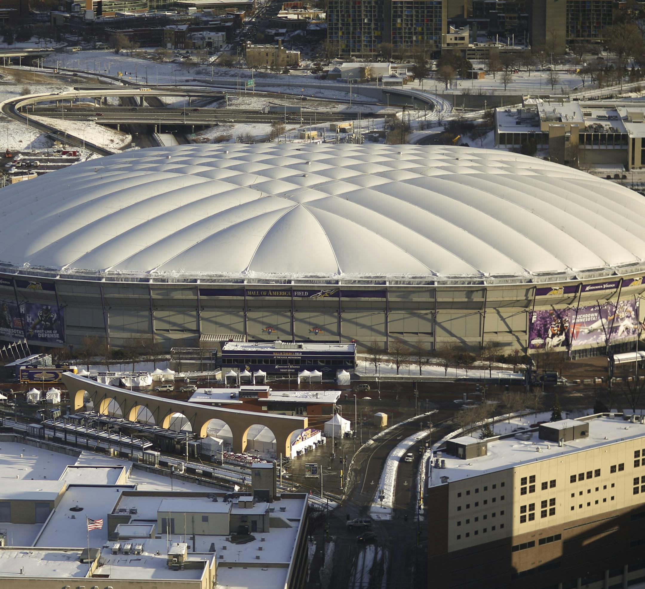 The Metrodome, with the Star Tribune building in the foreground, in a view from the U.S. Bank building Tuesday afternoon, December 17, 2013 in Minneapolis. ] JEFF WHEELER ‚Ä¢ jeff.wheeler@startribune.com