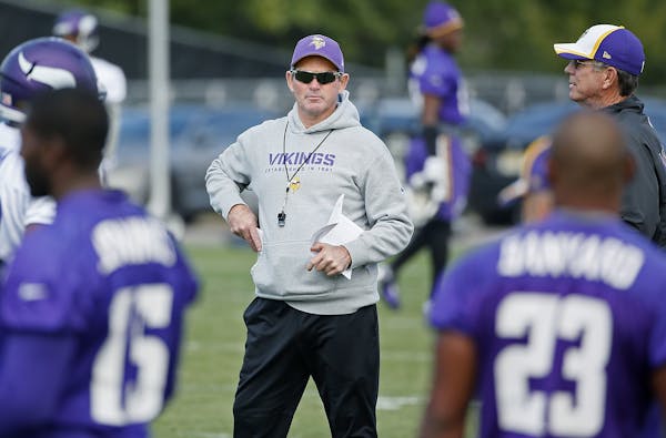 Minnesota Vikings head coach Mike Zimmer took to the field for practice at Winter Park, Friday, September 19, 2014 in Eden Prairie, MN.