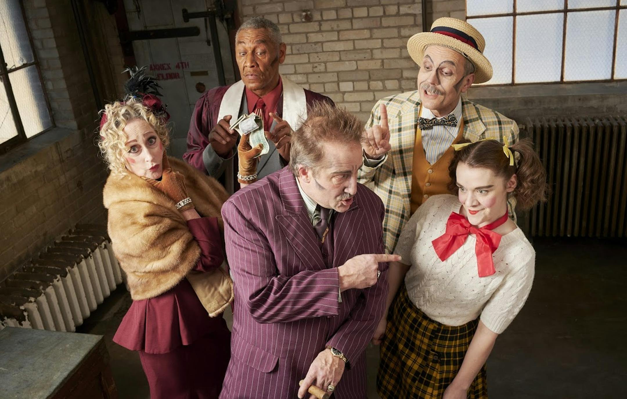 Frank Theatre's "The Cradle Will Rock" appears through April 7 at Gremlin Theatre in St. Paul. The large cast includes (back, from left) JoeNathan Thomas and Bob Beverage and (front, from left) Molly Sue McDonald, JC Cutler and Chelsie Newhard.