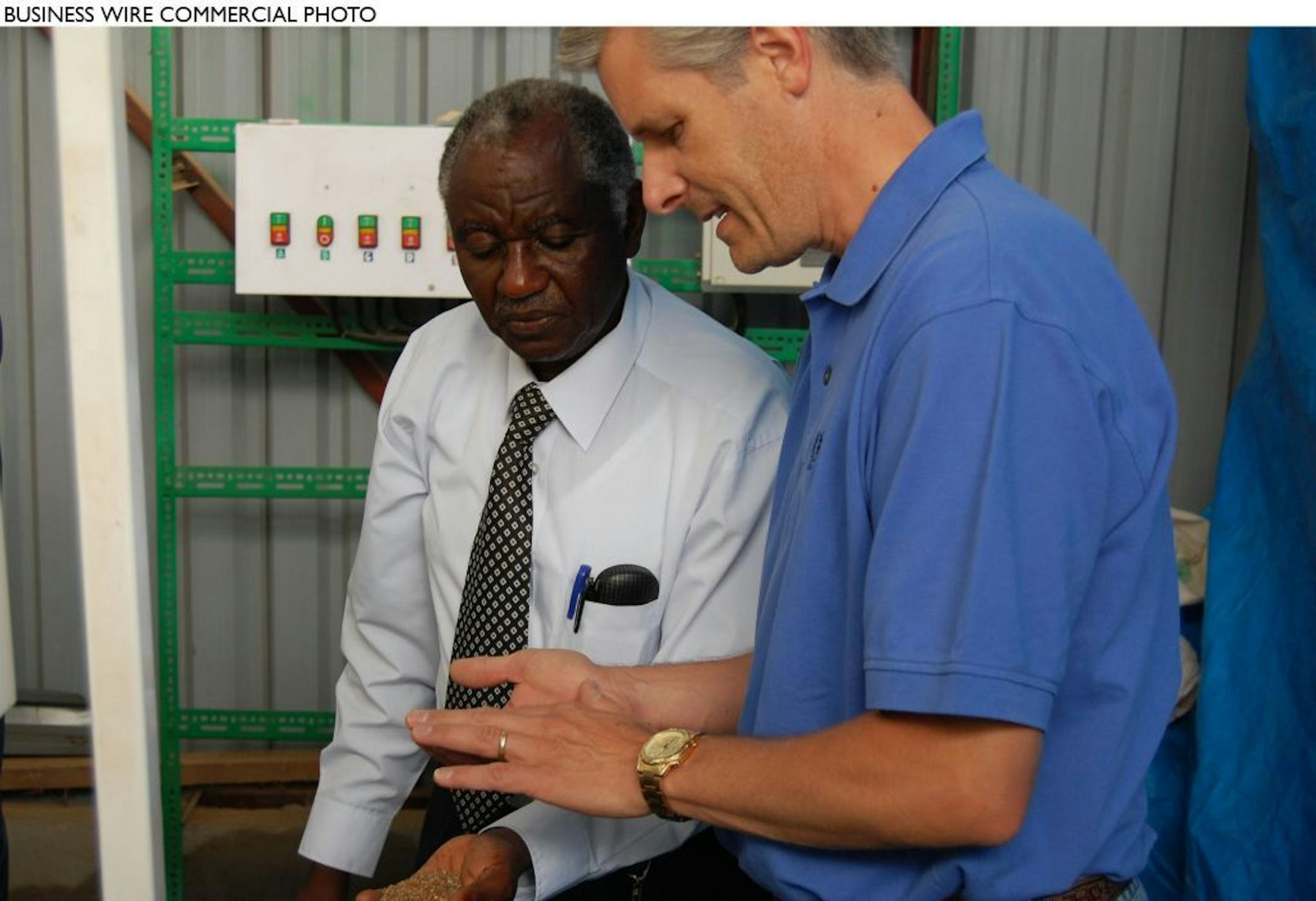 Robert Nyirenda, Owner, Nyirefami Grains Ltd., Tanzania with Peter Erickson, SVP, Innovation, Technology & Quality, General Mills. Nyirefami mills flour made from corn, wheat, bananas, sorghum and millet. Partners in Food Solutions assisted with installation of a quality control lab and improvements to washing and pre-drying operations. With help from Partners in Food Solutions, the company's capacity rose from one metric ton per day to five, and its farmer-suppliers were able to build a health
