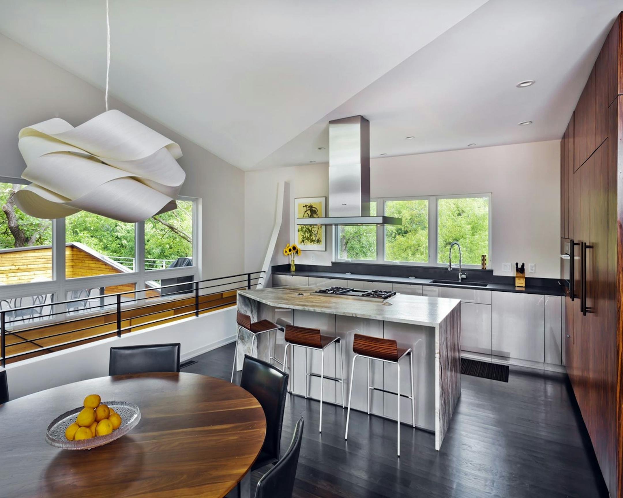 Home of he Month: RoehrSchmitt Architecture translated the best features of a family's downtown loft into a new modern home . Credit Gilbertson Photography