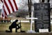 A cross was removed from a kneeling soldier at the veterans memorial park in Belle Plaine, MN. Advocates for the cross have been placing new ones at t