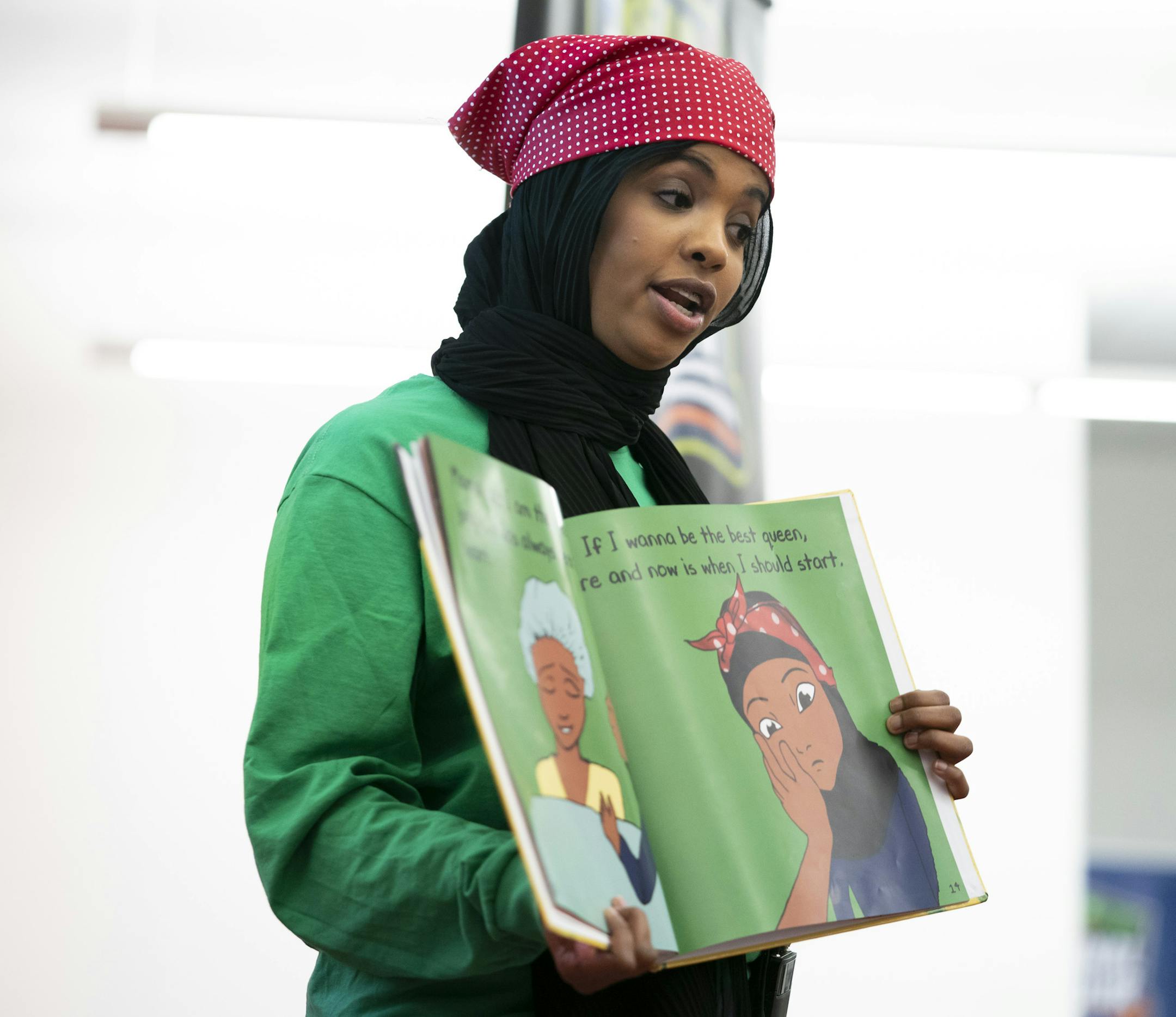 Habso Mohamud, 24, a St. Cloud author who wrote a children's book to inspire kids to make a difference in the world, read her book "It Only Takes One Yes," at the Children's Museum in St. Paul, Minn., on Monday, January 21, 2019. ] RENEE JONES SCHNEIDER ¥ renee.jones@startribune.com