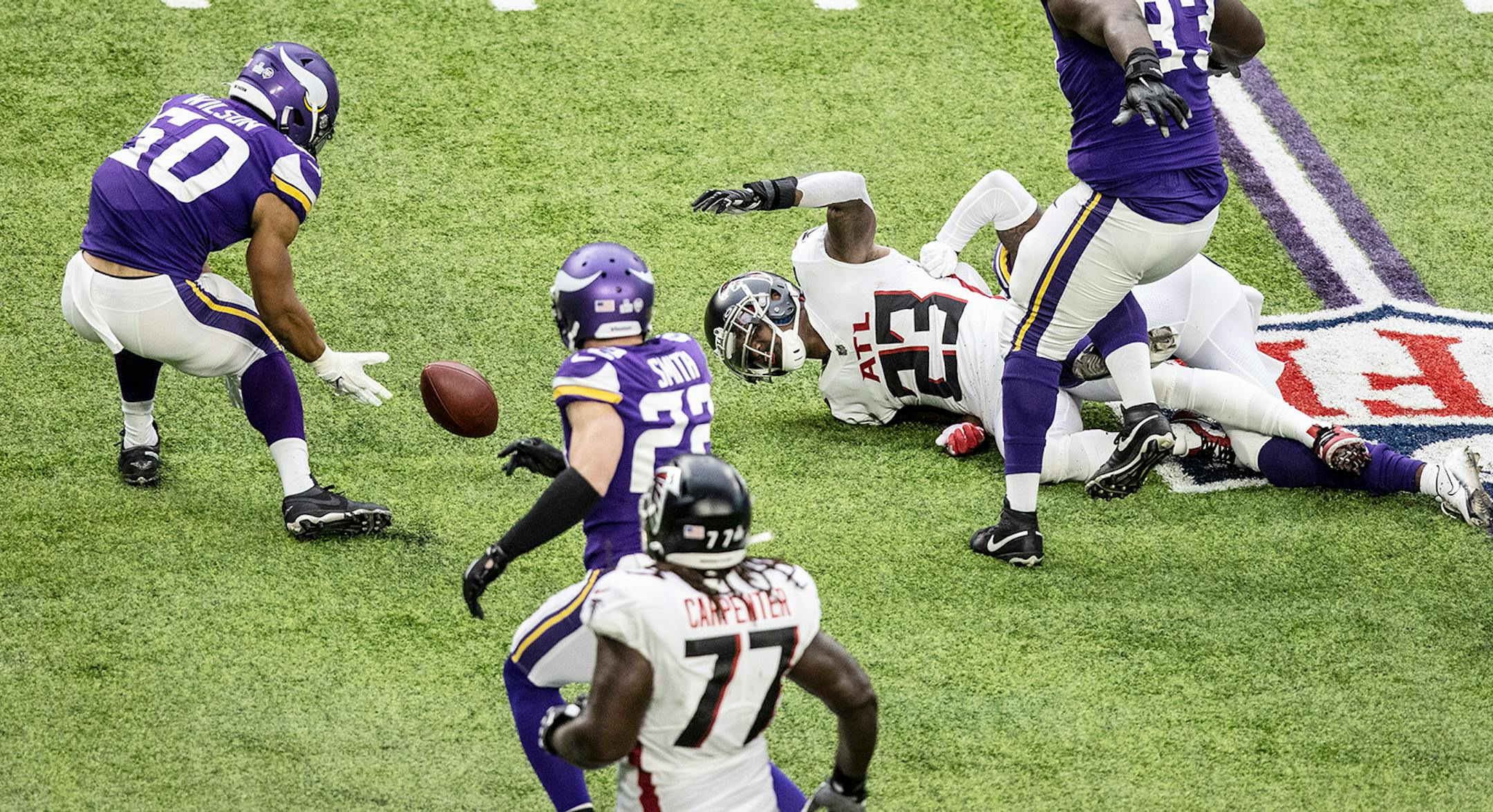 Minnesota Vikings outside linebacker Eric Wilson (50) recovered a Atlanta Falcons running back Brian Hill (23) fumble in the second quarter.