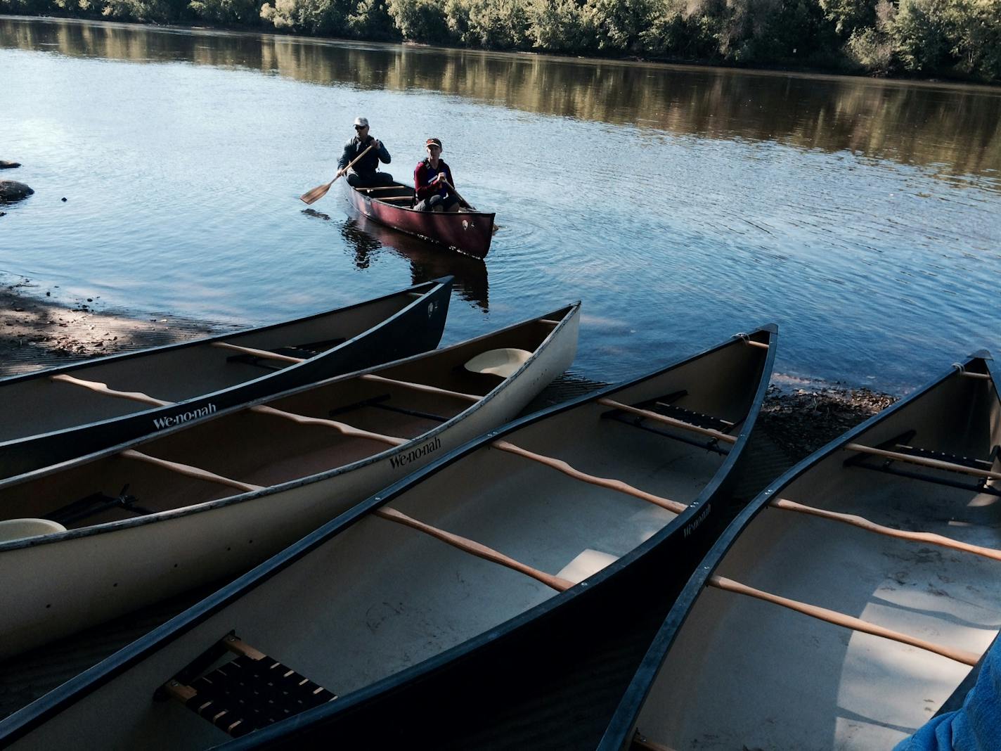 Erik Wrede, water trails coordinator with Minnesota Department of Natural Resources and Mary Hammes, volunteer manager with the nonprofit Mississippi River Fund, launch their canoe Thursday morning at Mississippi West Regional Park in Ramsey. They were part of a group of national, state and local stakeholders testing out a possible National Park Service canoe and bike share along the river. The Twin Cities is home to the 72-mile-long Mississippi National River & Recreation Area.