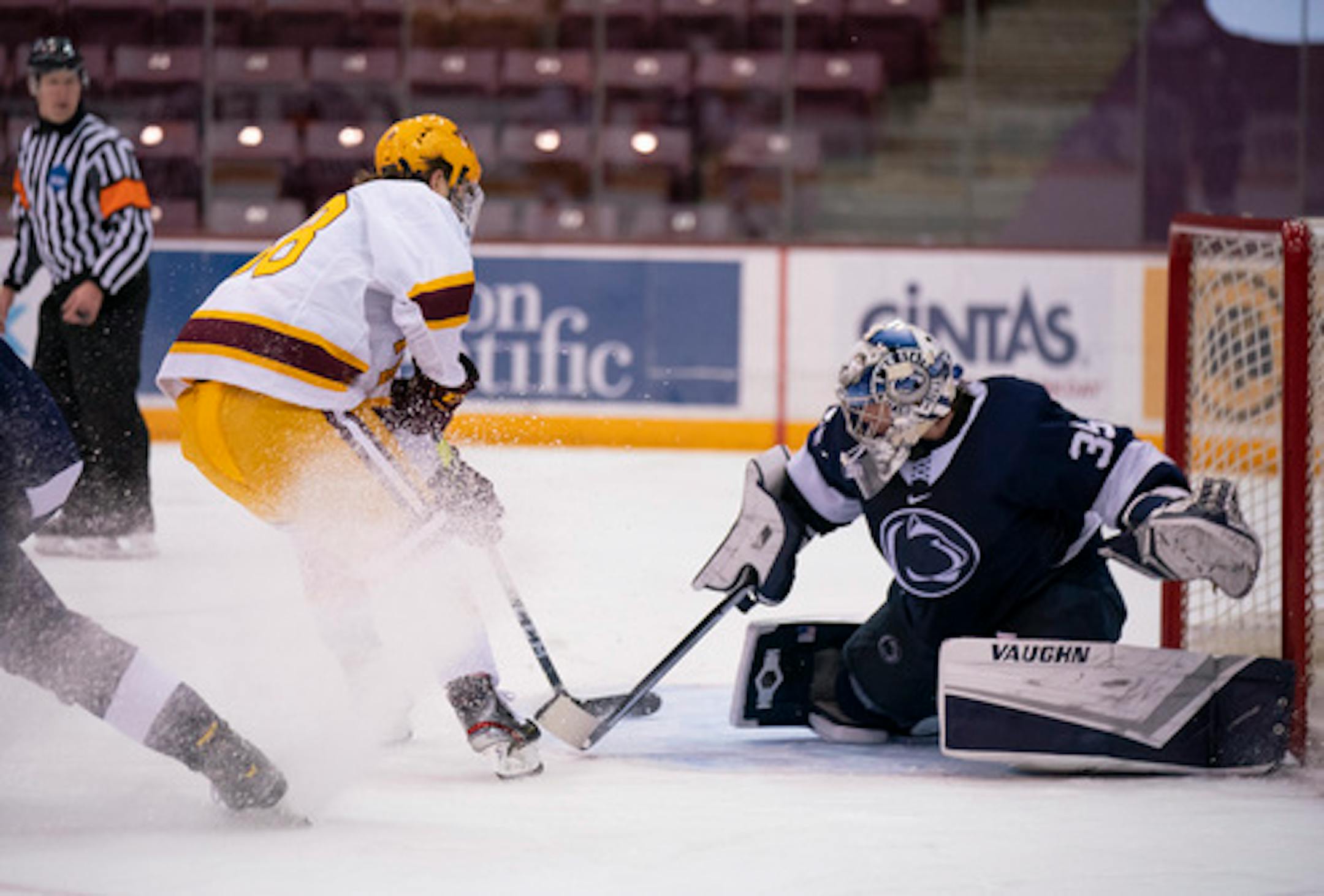 Gophers forward Samp Ranta finished an end-to-end rush by scoring against Penn State's Oskar Autio during the third period of Minnesota's season-opening 4-1 win on Thursday night at 3M Arena at Mariucci.