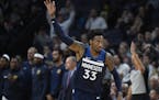 Minnesota Timberwolves forward Robert Covington (33) celebrated after hitting a 3-pointer against the Denver Nuggets in the third quarter. ] Aaron Lav