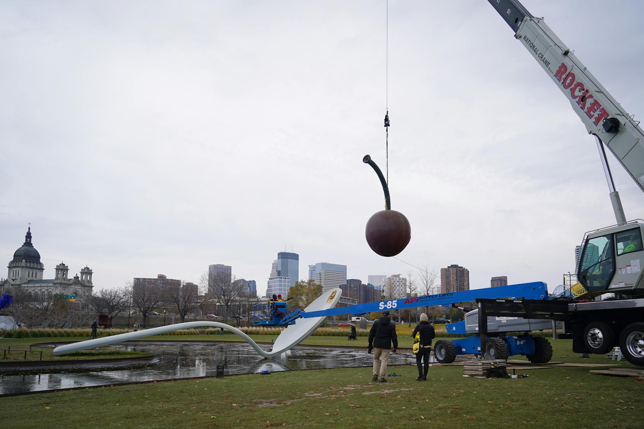 The 17500 pound aluminum cherry ball is unbolted, lifted, and separated from the Spoonbridge base it sits atop at the Sculpture Garden in Minneapolis, Minn., on Tuesday, Nov. 16, 2021. Due to the typically harsh conditions of Minnesota winters, this iconic Minneapolis fruit requires a fresh coat of paint about every ten years to keep the cherry's red crisp and glossy. ] SHARI L. GROSS • shari.gross@startribune.com