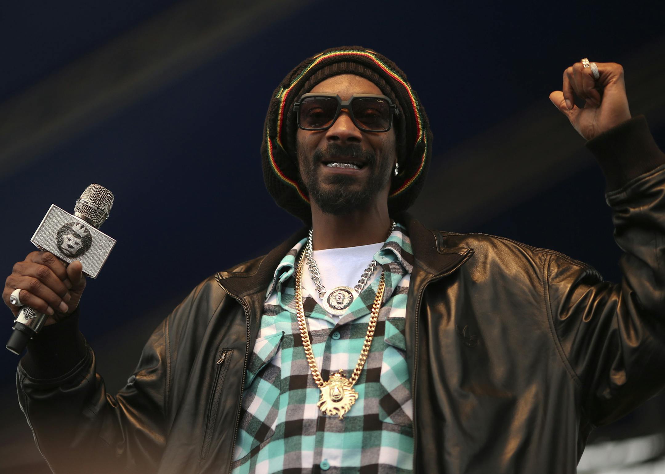Rhymesayers Entertainment's annual Soundset music festival took place on a chilly Sunday afternoon, May 26, 2013 at Canterbury Downs in Shakopee. Snoop Lion, the artist formerly known as Snoop Dogg, used a mic with a lion logo on it as he performed during his festival-closing set at Soundset 2013 Sunday night. ] JEFF WHEELER ‚Ä¢ jeff.wheeler@startribune.com