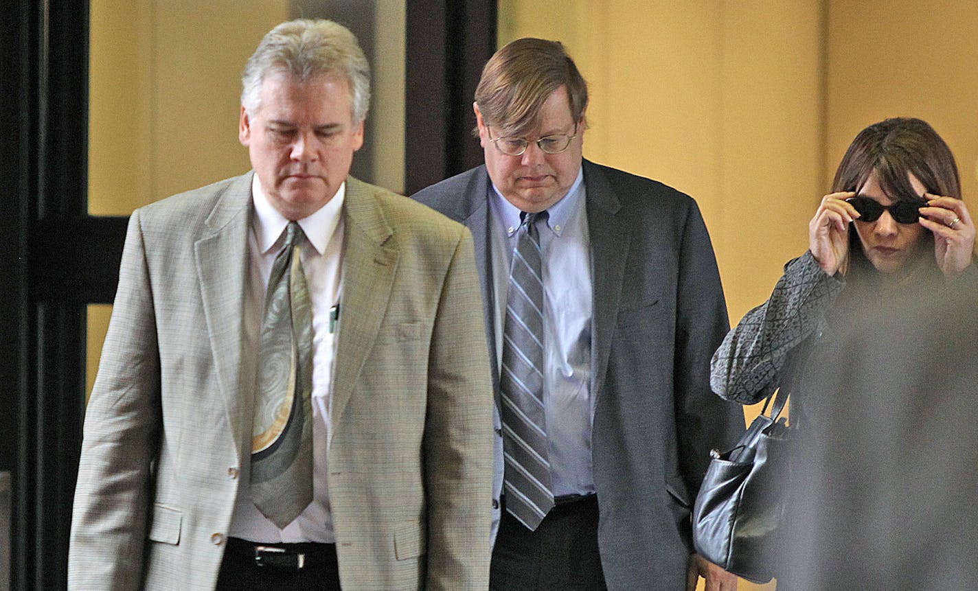 In this file photo, Frank Vennes, left, made his way out of the Federal Courthouse in St. Paul on Wednesday, June 5, 2013.