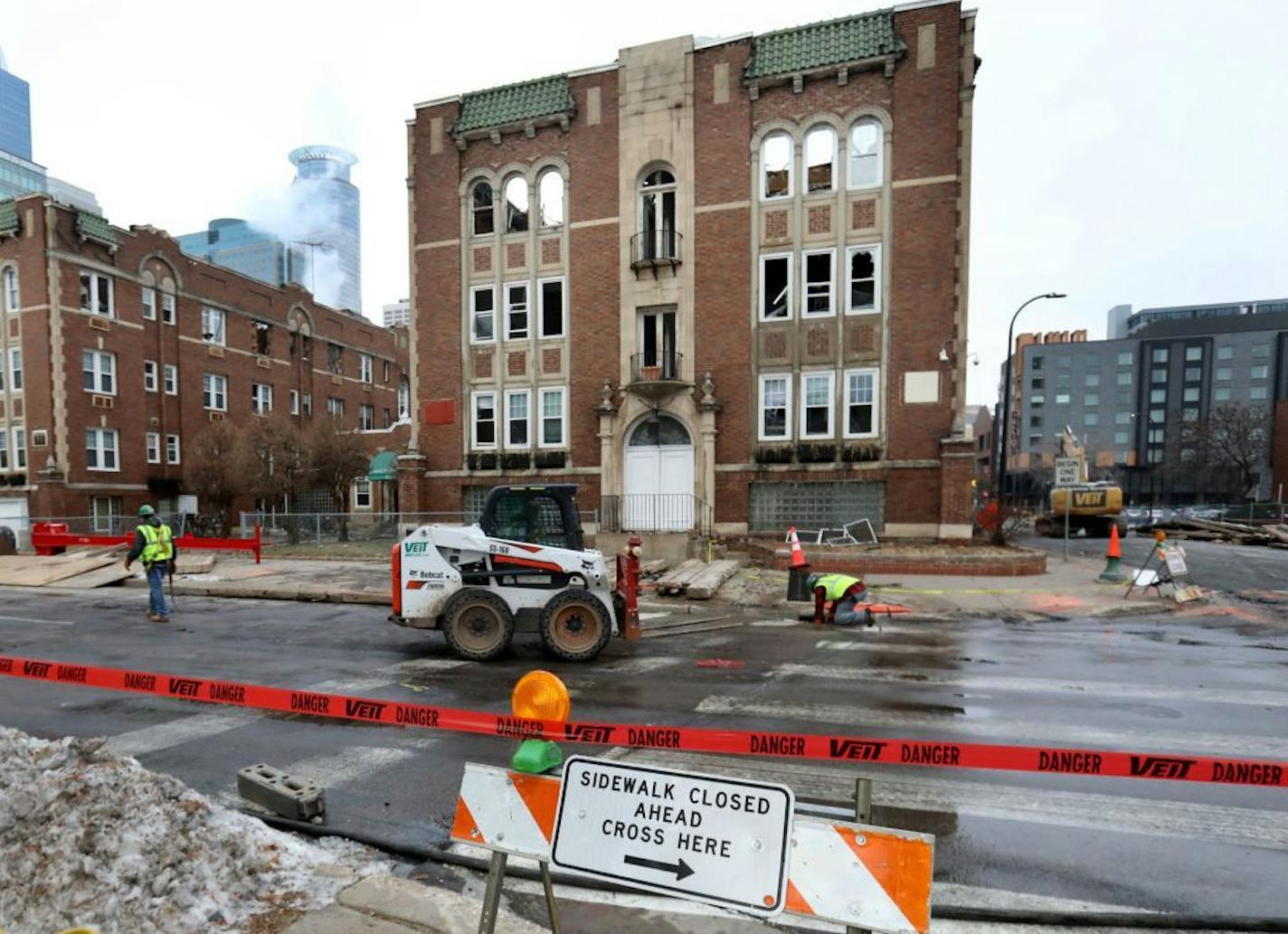 Demolition crews prepare the east portion of the Francis Drake Hotel apartments, severely damaged in a Christmas Day fire, for demolition Friday, Dec. 27, 2019, in downtown Minneapolis, MN.