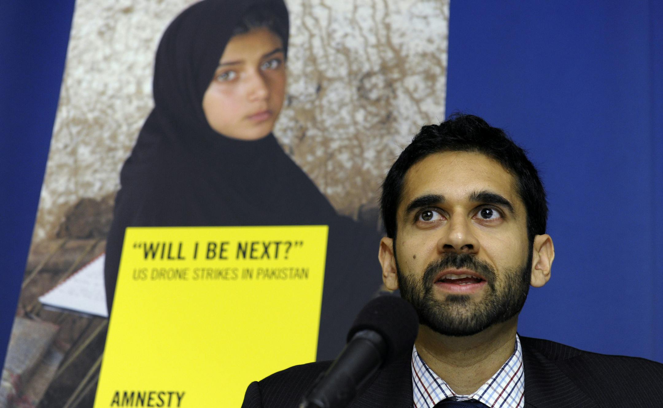 Mustafa Qadri, a Pakistan researcher at Amnesty International, talks about the findings of two new reports, by Amnesty International and Human Rights Watch on US drone strikes and other air strikes in Pakistan and Yemen, Tuesday, Oct. 22, 2013, during a news conference at the National Press Club in Washington. (AP Photo/Susan Walsh)