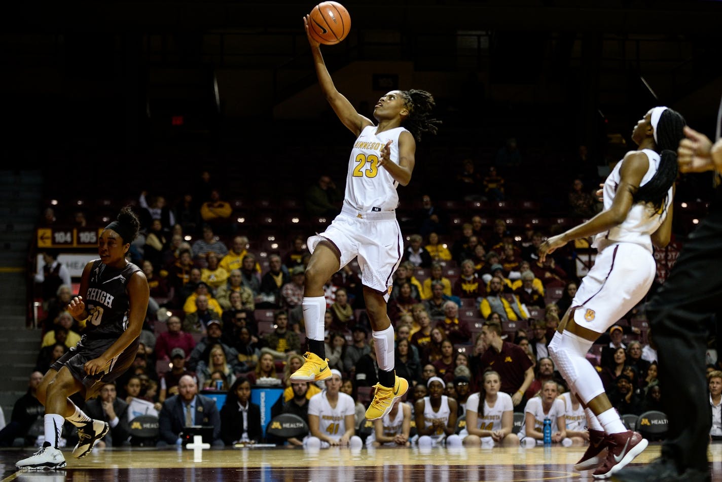 Gophers guard Kenisha Bell, shooting here last month, had 20 points Sunday in a loss at San Diego.