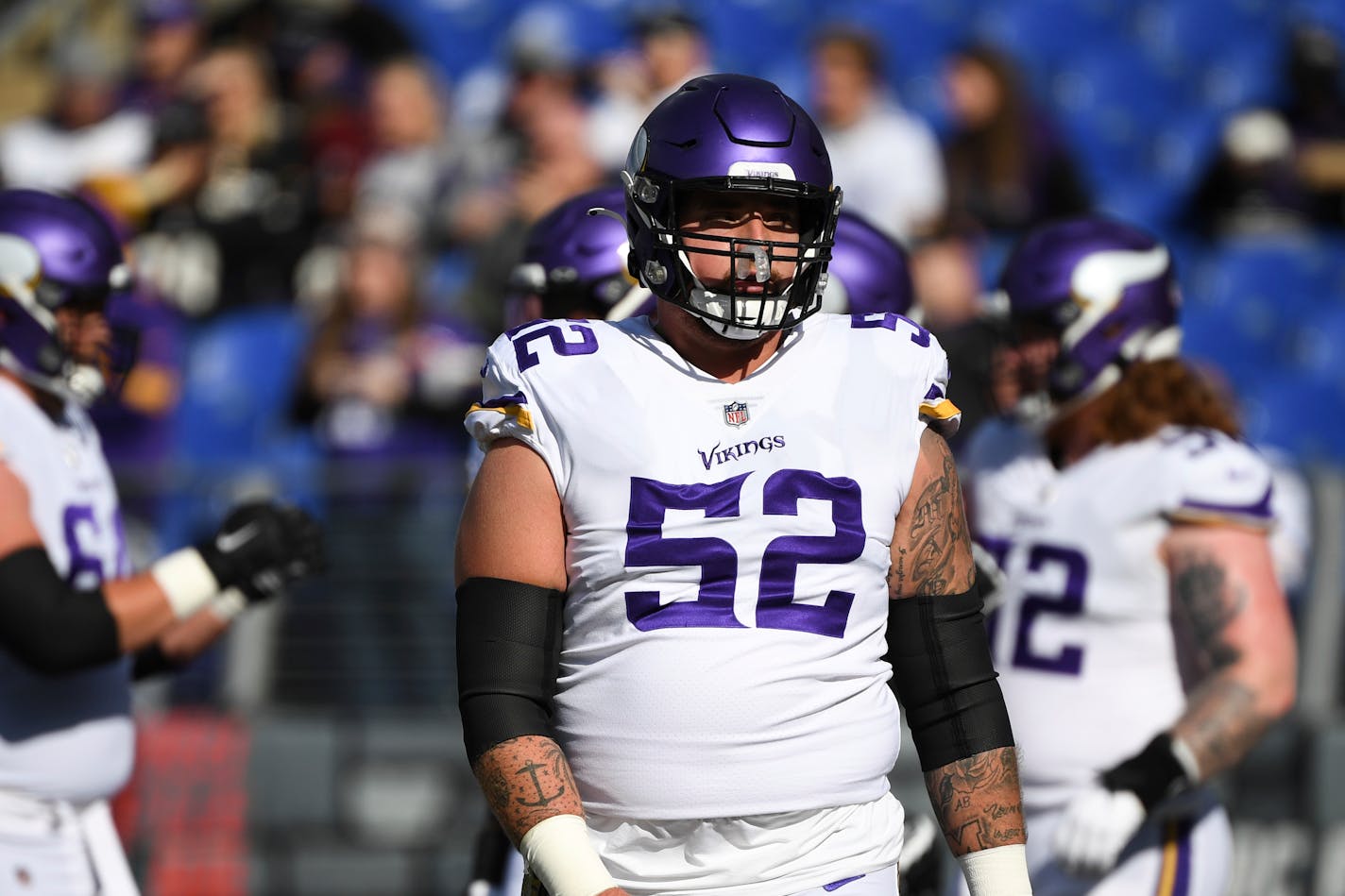 Minnesota Vikings center Mason Cole (52) looks on during pre-game warm-ups before an NFL football game against the Baltimore Ravens, Sunday, Nov. 7, 2021, in Baltimore. (AP Photo/Terrance Williams)