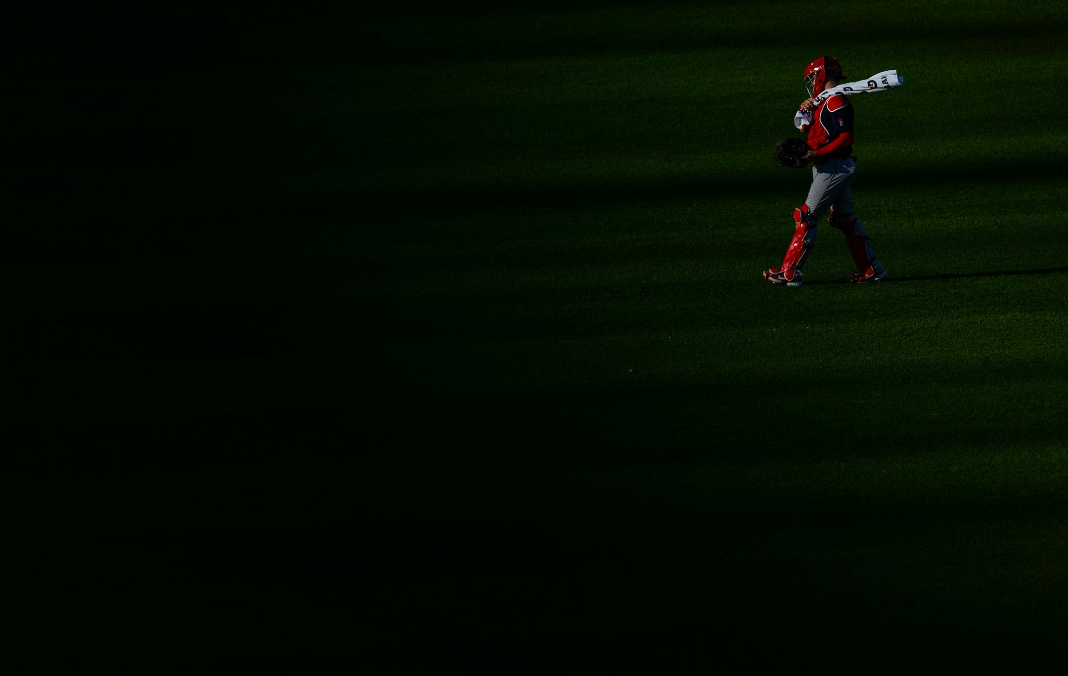 Boston Red Sox catcher Reese Mcguire walks on the field before the start of the game.