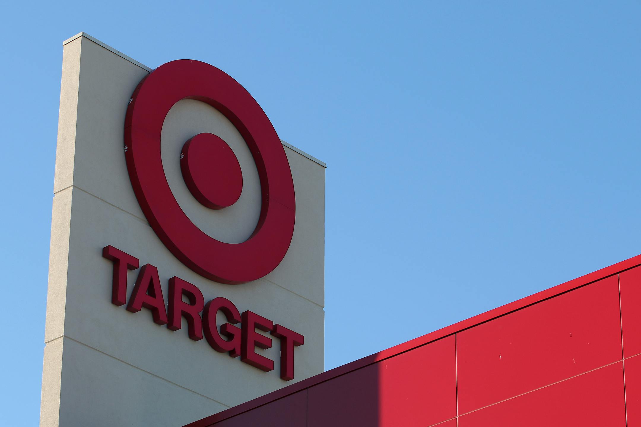 Target Corp. signage is displayed at a new store in Chicago, Illinois, U.S., on Tuesday, Oct. 8, 2013. The Bloomberg Consumer Comfort Index, a survey which measures attitudes about the economy, is scheduled to be released on Oct. 10. Photographer: Tim Boyle/Bloomberg