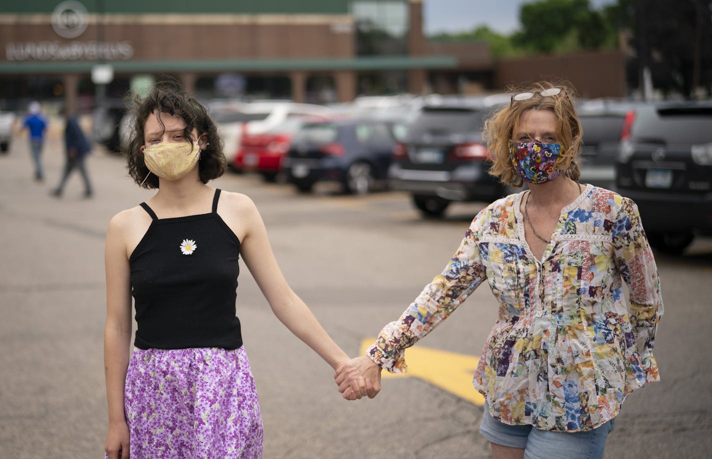 Gretchen Seichrist, with her daughter, Iris, both have compromised immune systems from Lyme disease. She said they wanted to sit in a coffee shop at Edina's 50th and France shopping district on Monday, June 29, but they felt uncomfortable with the number of people who were not wearing masks.