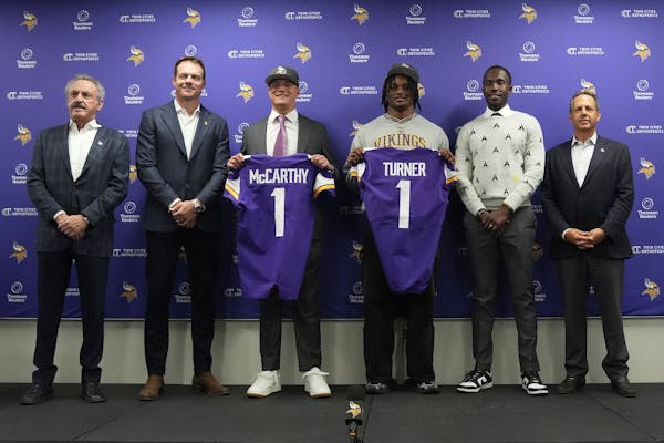 From left, Vikings owner Zygi Wilf, coach Kevin O'Connell, first-round draft picks J.J. McCarthy and Dallas Turner, General Manager Kwesi Adofo-Mensah