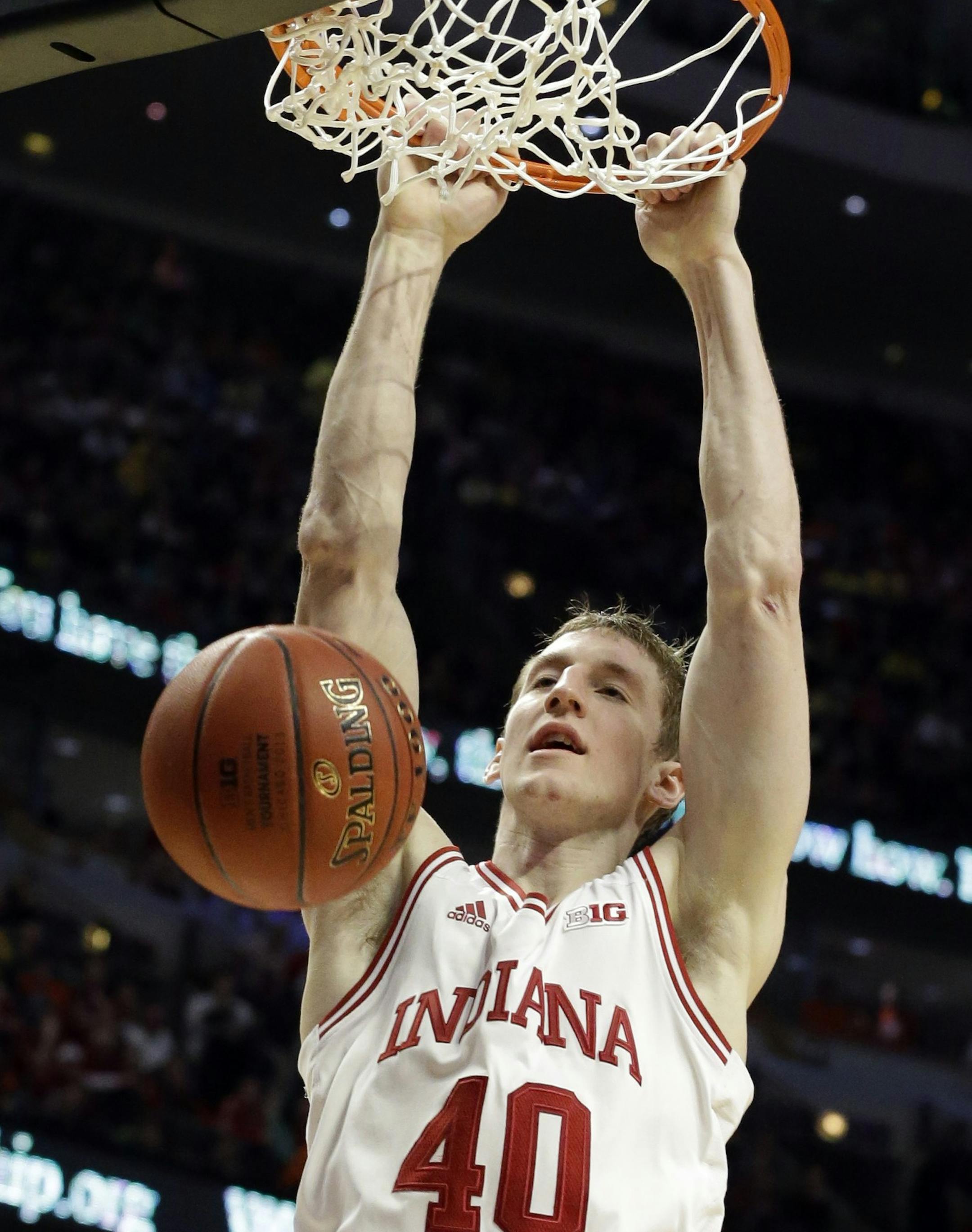 Indiana's Cody Zeller dunks during the second half of an NCAA college basketball game at the Big Ten tournament against Illinois Friday, March 15, 2013, in Chicago. (AP Photo/Nam Y. Huh)
