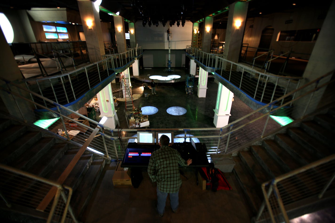 As workers finished Epic's $3.5 million renovation of the old Quest space this week, Joe Holloway tested the lights from atop the club's new grand staircase.