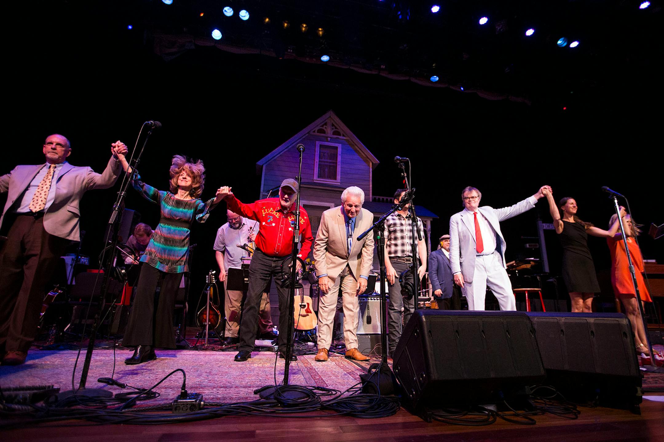 Garrison Keillor takes a bow with the performers after the show at the Ryman Auditorium in Nashville.
