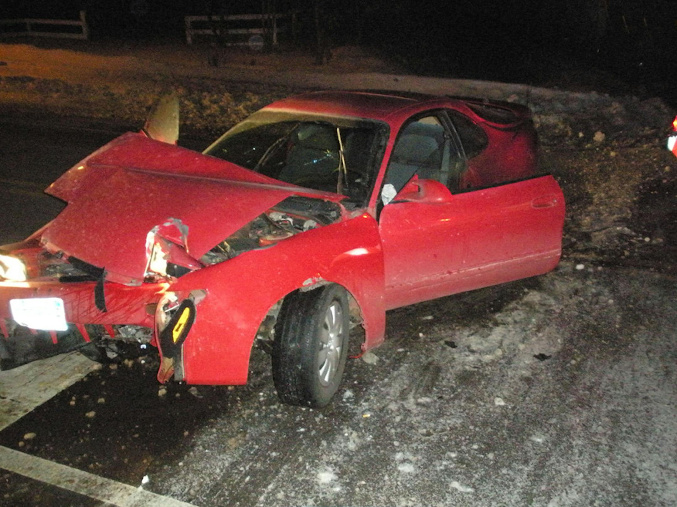 The damaged car of the drunken motorist who tried to beat a train at a crossing in Plymouth.