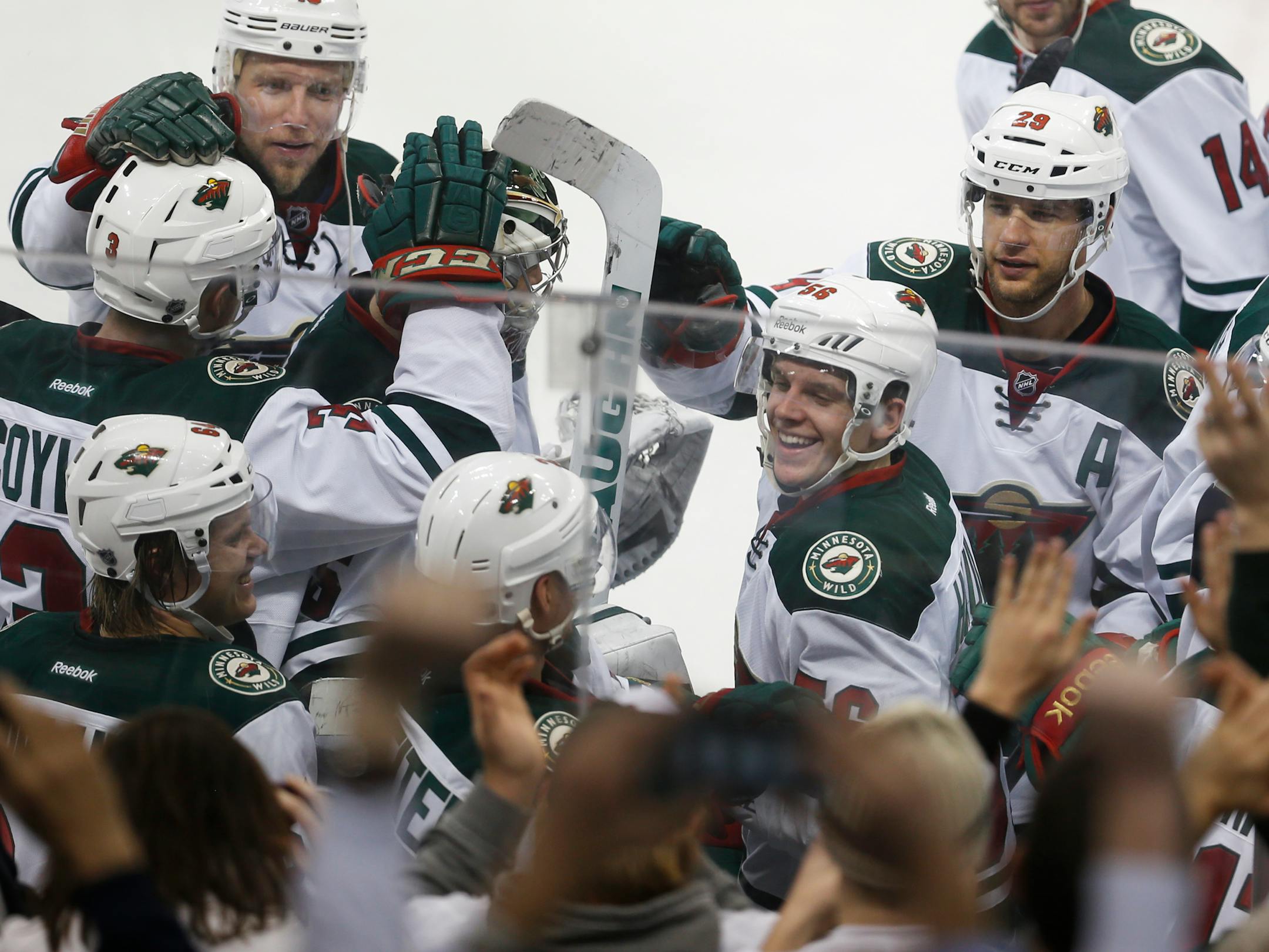 The Wild celebrate their sudden death win as Nino Niederrereiter scored the winning goal.