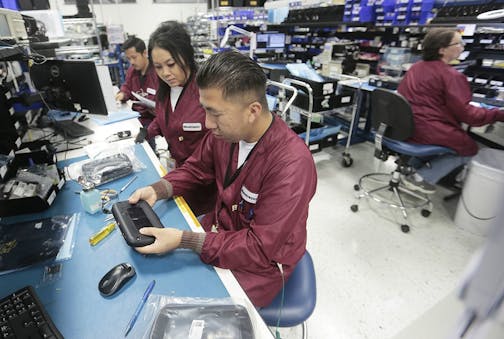 Workers at the Minnetronix manufacturing facility in St. Paul. The company Minnetronix, a St. Paul-based company that manufactures medical devices under contract for other firms,The company told Gov. Tim Walz' administration Wednesday that it could quickly begin making ventilators for Minnesotans, potentially using the plans published by Medtronic.