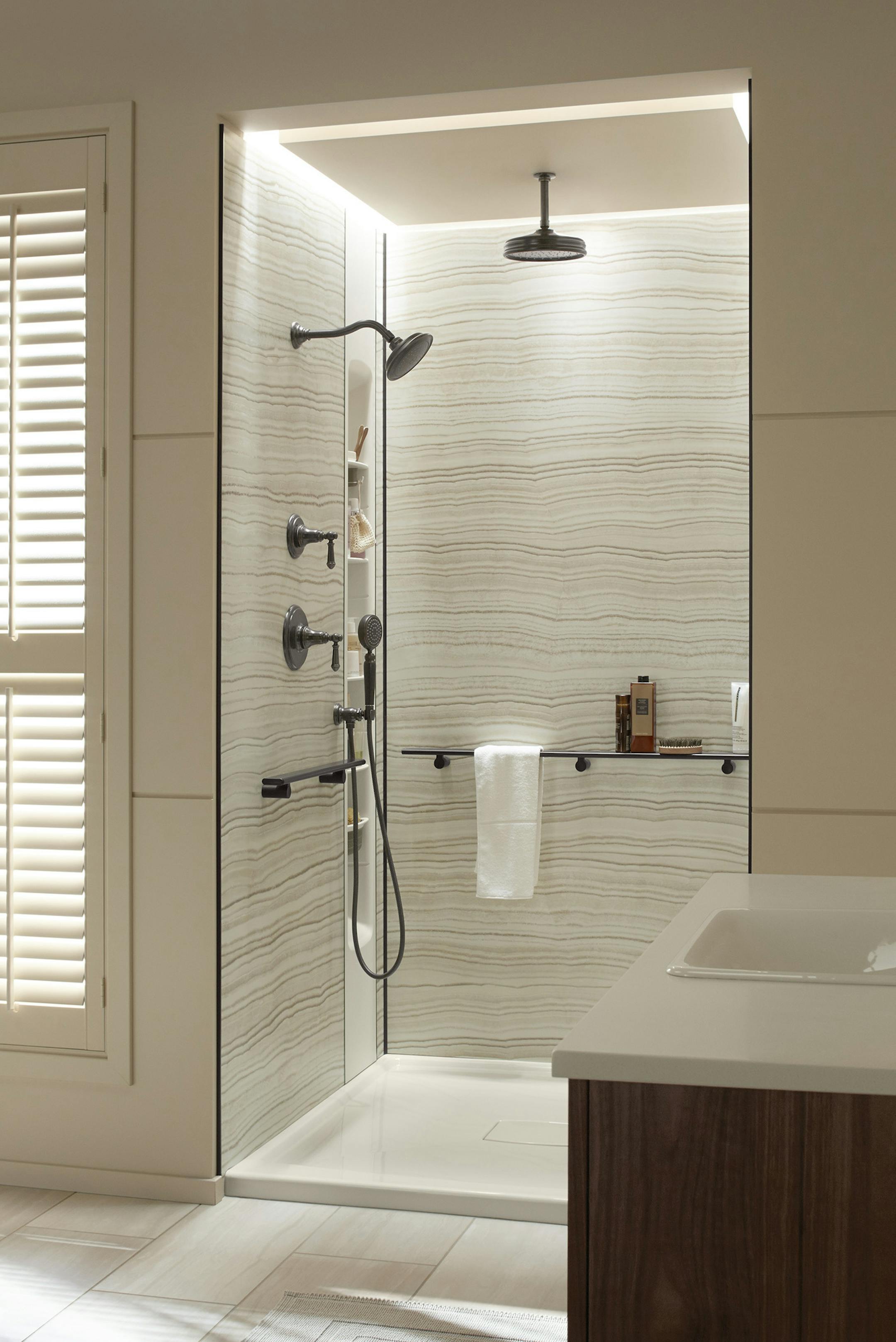 While grab bars have been used for years in many showers, custom grab bars include decorative features for form and function. (Kohler) ORG XMIT: 1181500