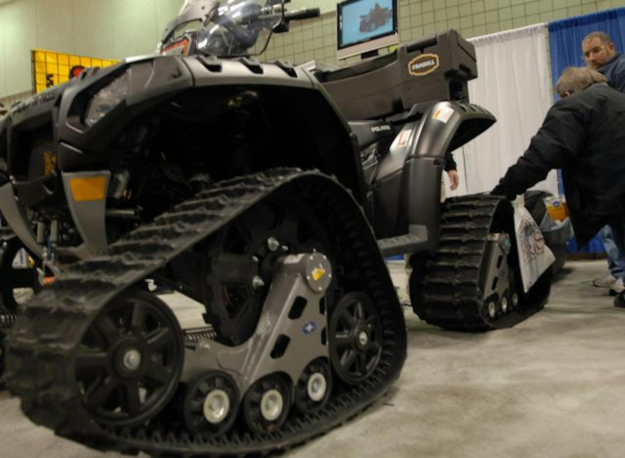 Tired of that four-wheeler getting stuck in the snow? Machines rigged with tracks avoid that problem in winter.