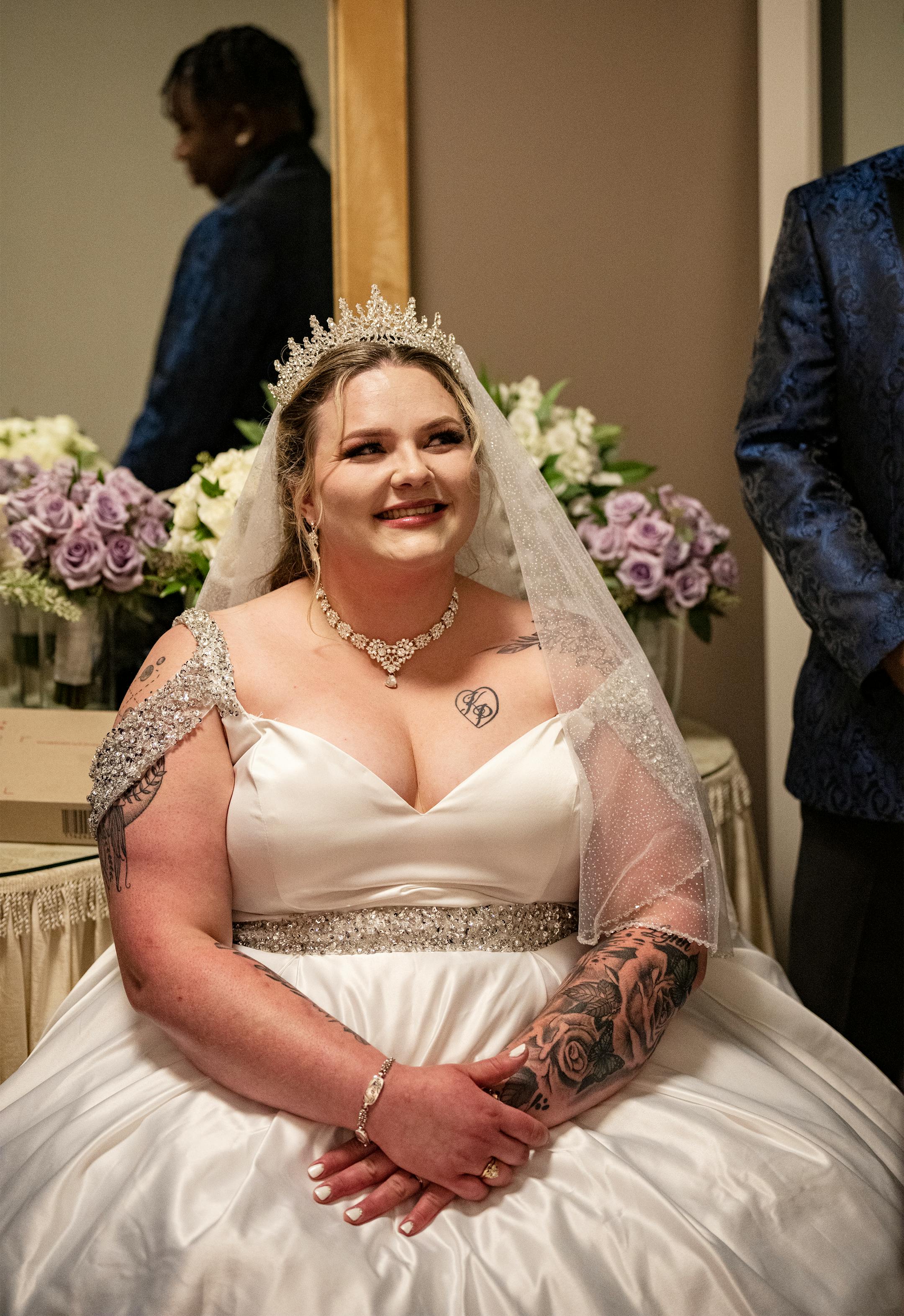 Andrea Price waits for her wedding ceremony to take place.