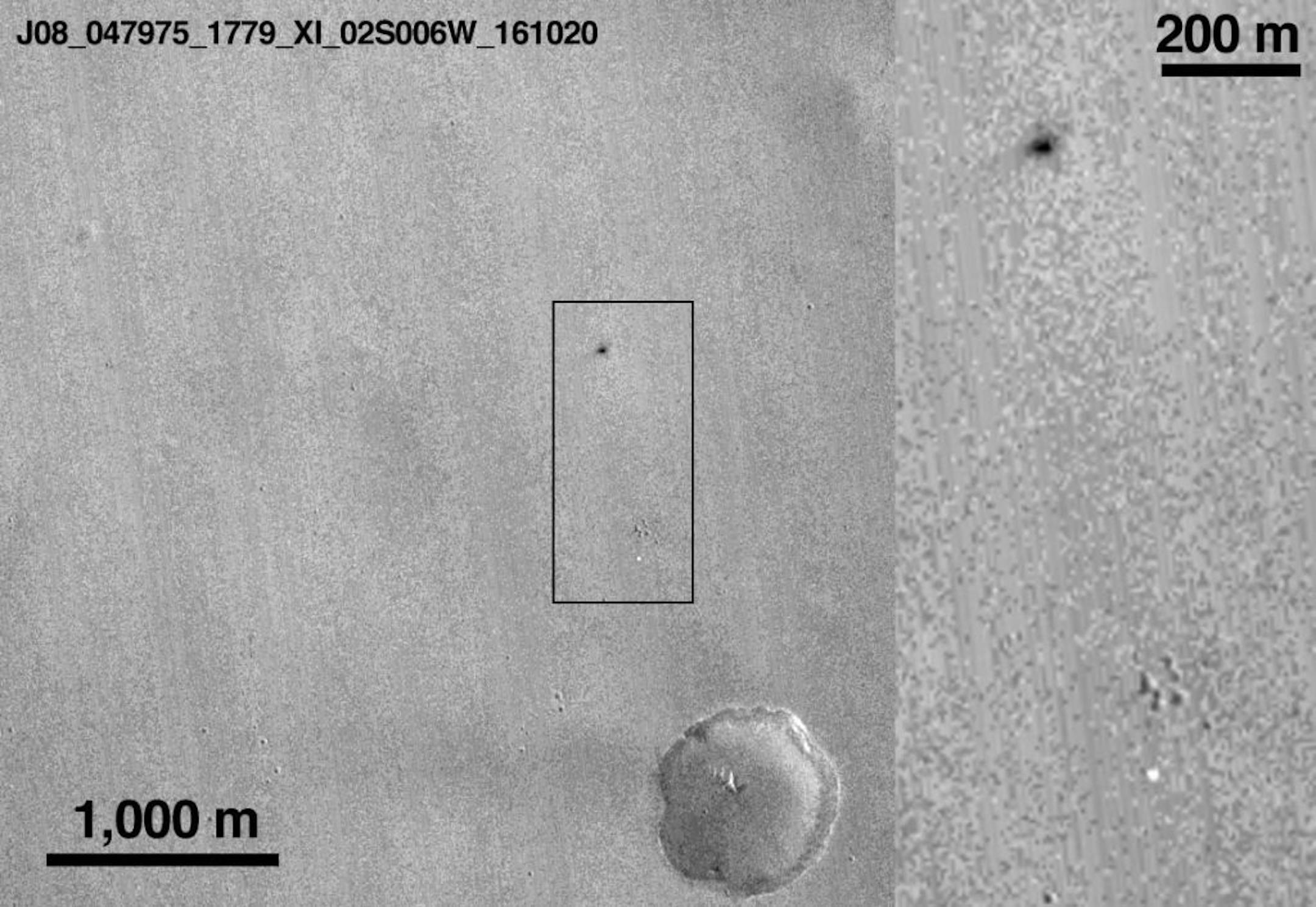 This comparison image shows two spots that likely appeared in connection with the Oct. 19, 2016, Mars arrival of the European Space Agency's Schiaparelli test lander. The image is from the Context Camera on NASA's Mars Reconnaissance Orbiter.