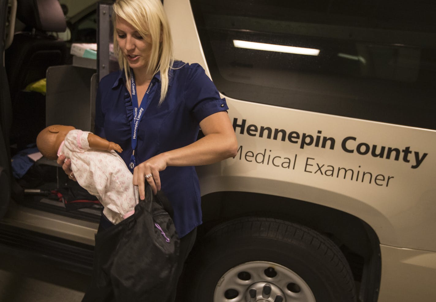 Hennepin County medical examiner's office investigator Raschael Ellering showed the doll they bring to the scene to help understand infant deaths with witnesses at Hennepin County Medical Examiners office on Friday, August 14, 2015 in Minneapolis, Minn. ] RENEE JONES SCHNEIDER &#x2022; reneejones@startribune.com