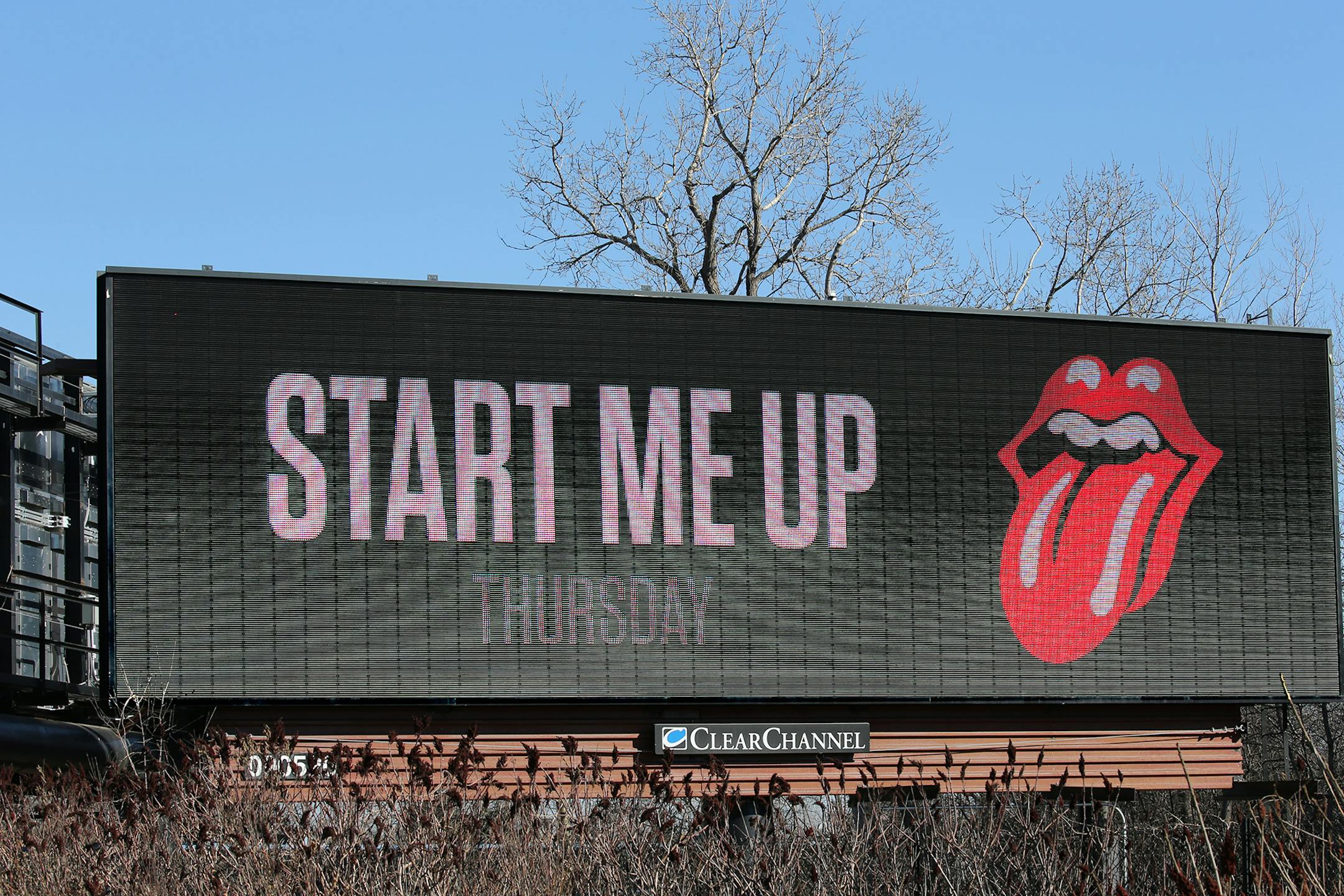 an electronic billboard with the Stones' tongue logo that says "Satisfaction Thursday," which would presumably mean they're announcing their local concert on Thu. Maybe a good standalone photo-op for over the weekend? They're popping up in other cities too, including Atlanta, Milwaukee, Columbus and Buffalo (they're really hitting America's most beautiful metropolises!. It's on 494 going west (by northwest) jus past the 62 insect.
