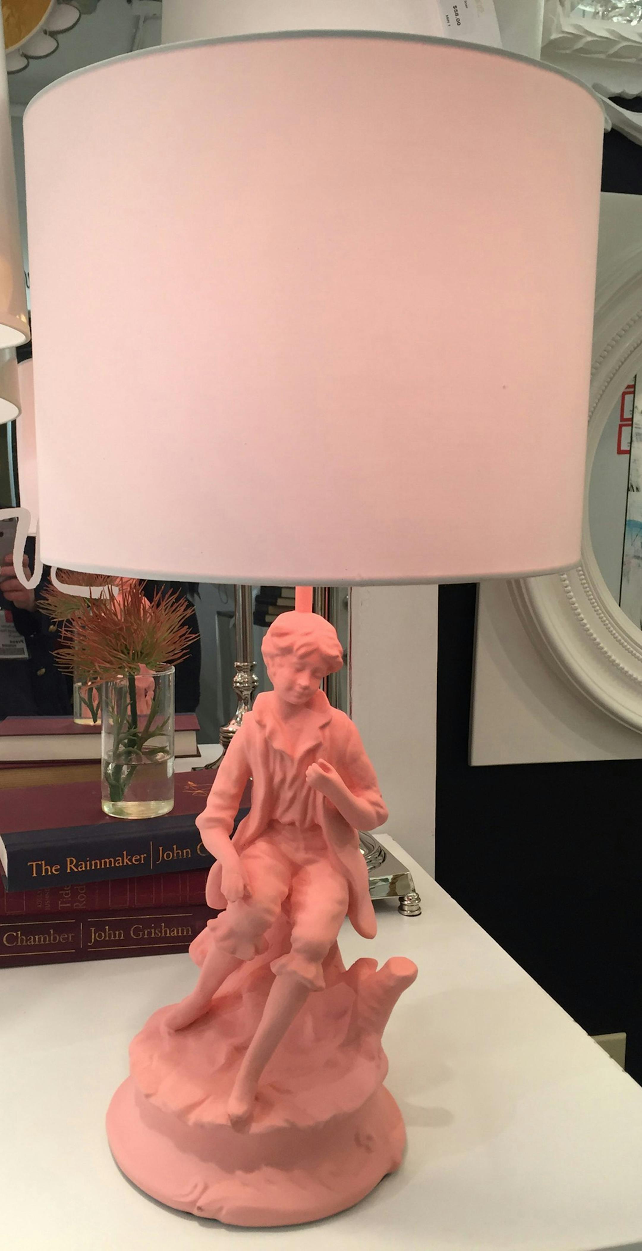 Boy figurine table lamp in pink painted resin in a matte finish from Barbara Cosgrove. There is also a girl figurine if you prefer a traditional pair of lamps. (Patricia Sheridan/Pittsburgh Post-Gazette/TNS) ORG XMIT: 1204080