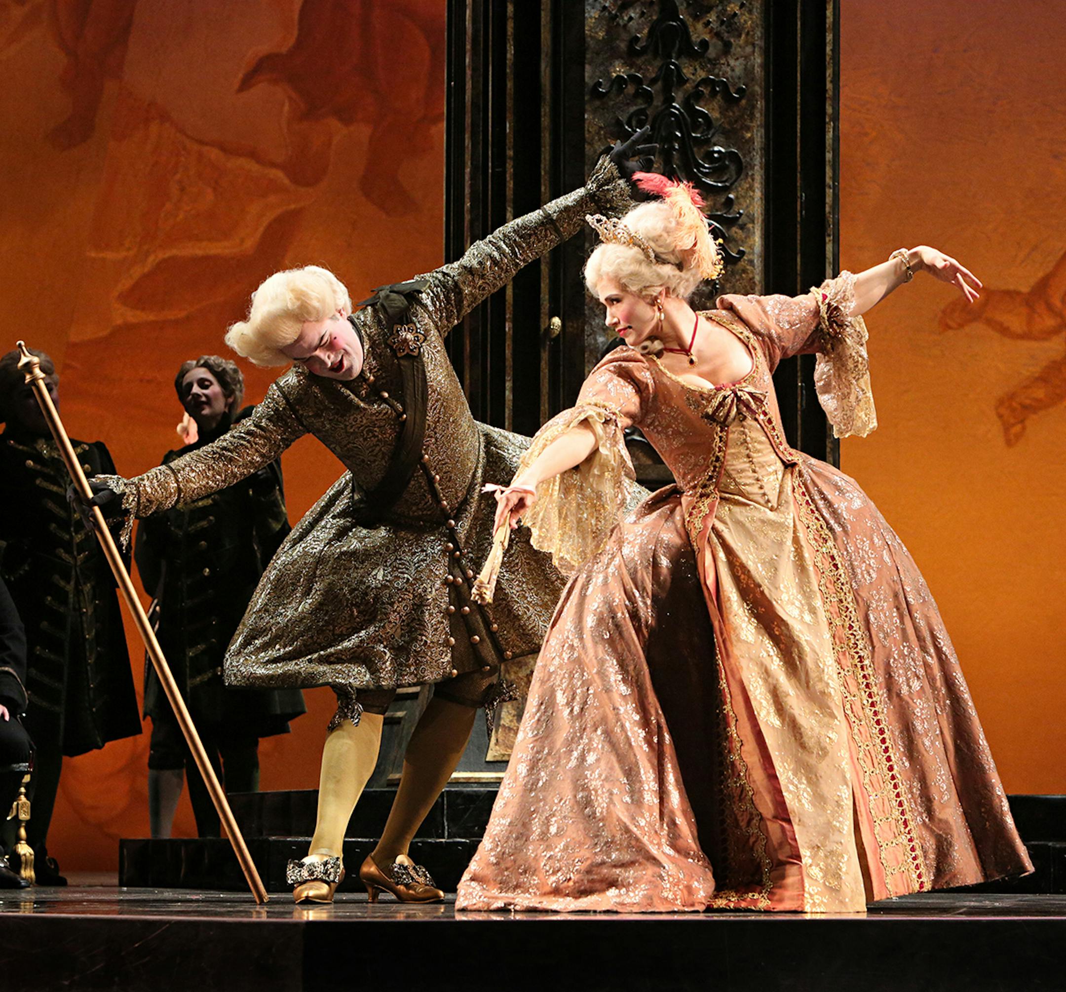 Michal Daniel Robb Asklof as The Dancing Master and Kelly Kaduce as Manon Lescaut in the Minnesota Opera production of Manon Lescaut Music by Giacomo Puccini?Libretto by Domenico Oliva and Luigi Illica?After the novel√äL√ïhistoire du chevalier des Grieux et de Manon Lescaut√äby Antoine-Fran¬çois Pr≈Ωvost √ä The Creative Team: Michael Christie - Conductor Michael Cavanagh - Stage Director John Pascoe - Set and Costume Designe