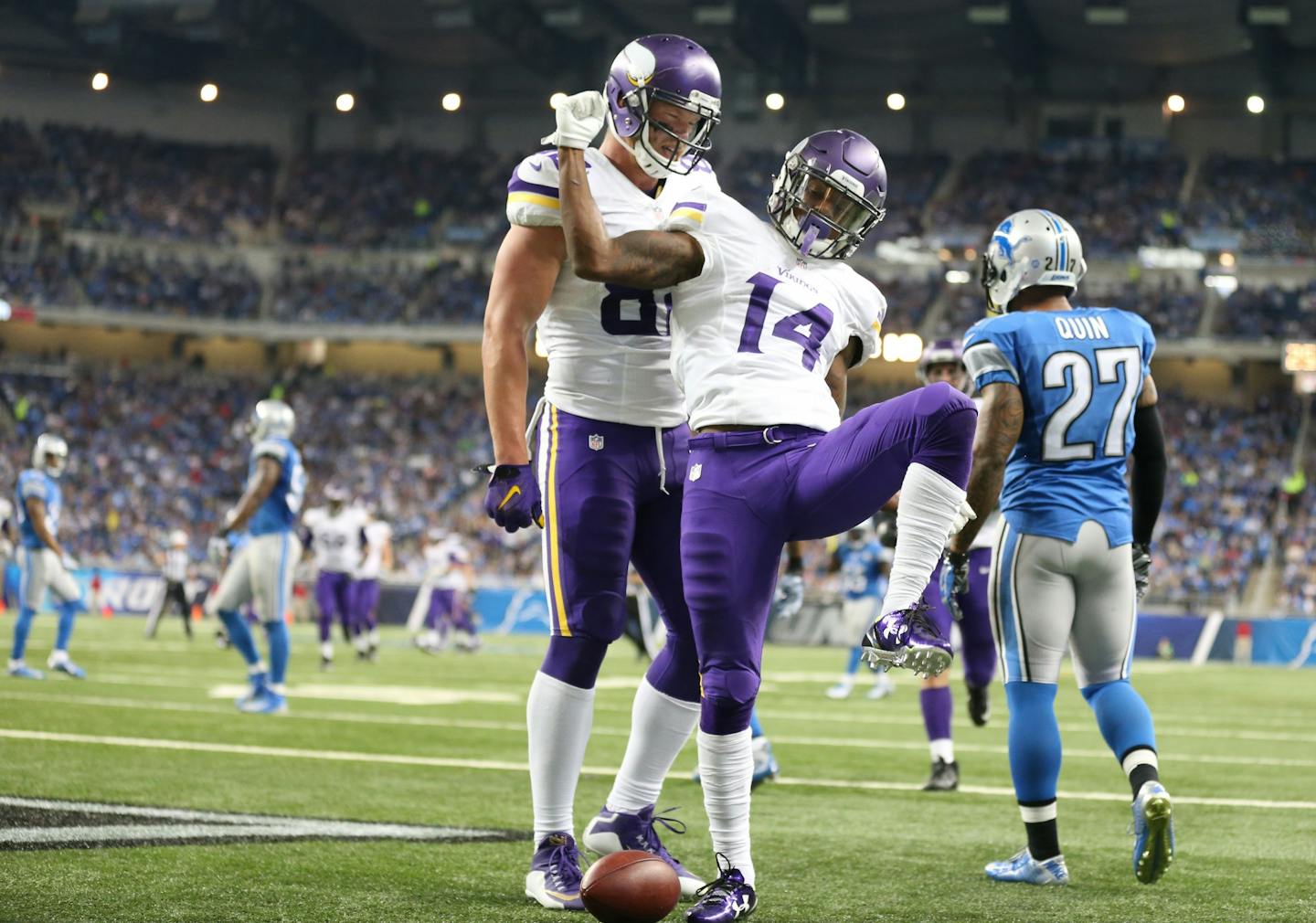 Minnesota Vikings wide receiver Stefon Diggs (14) celebrated his 35 yard touch down catch with tight end Kyle Rudolph (82) in the third quarter at Ford Field Sunday October 25, 2015 in Detroit, MI.