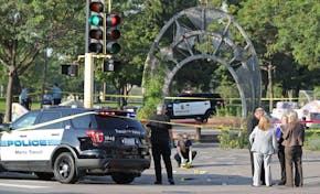 Police investigate after a man was shot and killed on the corner of E. Franklin and Chicago avenues shortly after 7 a.m. Friday in south Minneapolis.