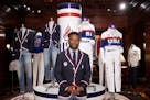Olympic athlete in fencing, Daryl Homer, models the Team USA Paris Olympics opening ceremony uniform at Ralph Lauren headquarters on Monday, June 17, 