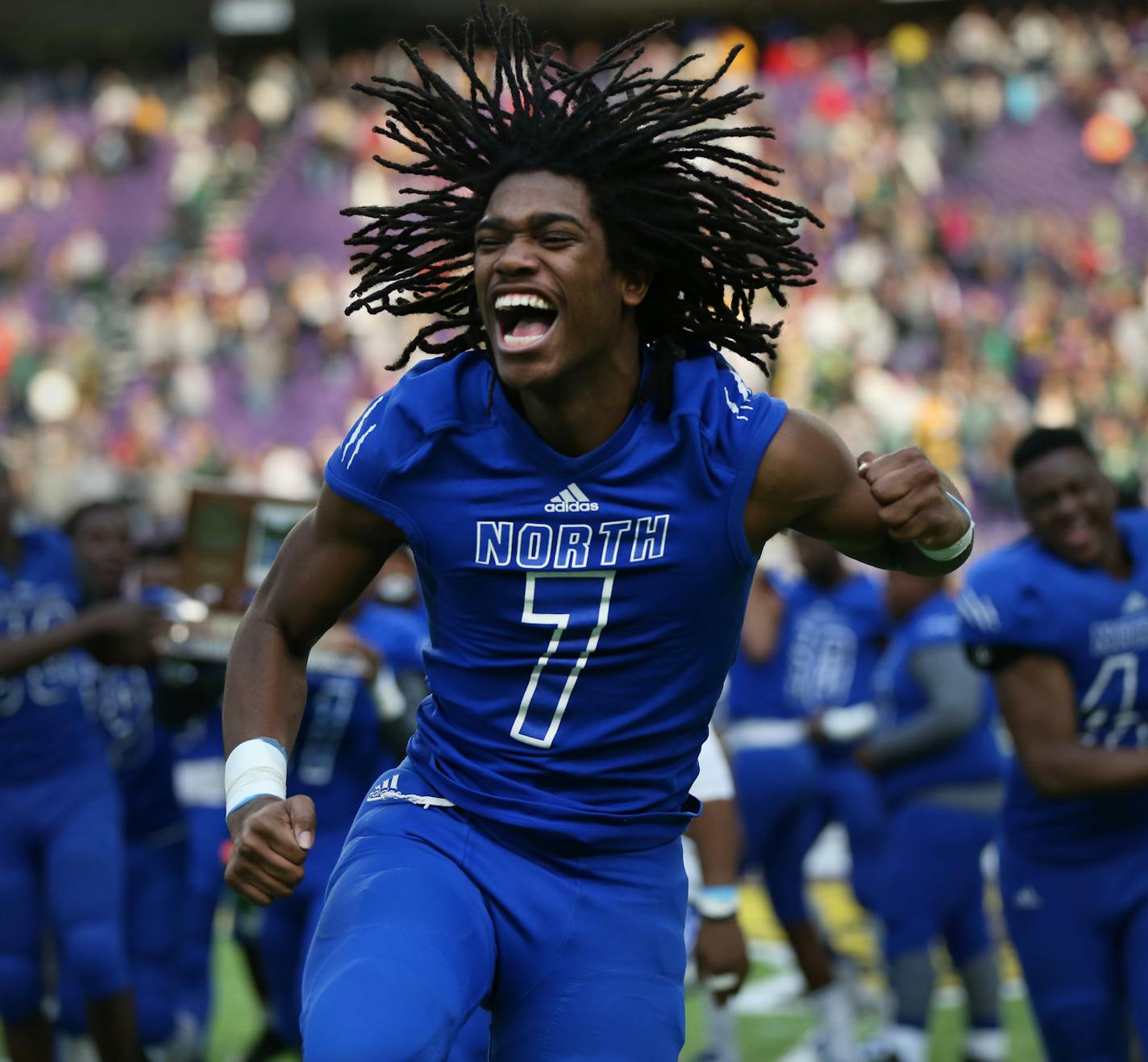 Charles Royston celebrated after his team, the Polars from Minneapolis North, won the Class 1A championship by defeating Rushford-Peterson 30-14. ] Shari L. Gross / sgross@startribune.com Minneapolis North defeated Rushford-Peterson 30-14 to earn their first title in the 1A football championship at U.S. Bank Stadium in Minneapolis, Minn. on Saturday, Nov. 26, 2016.