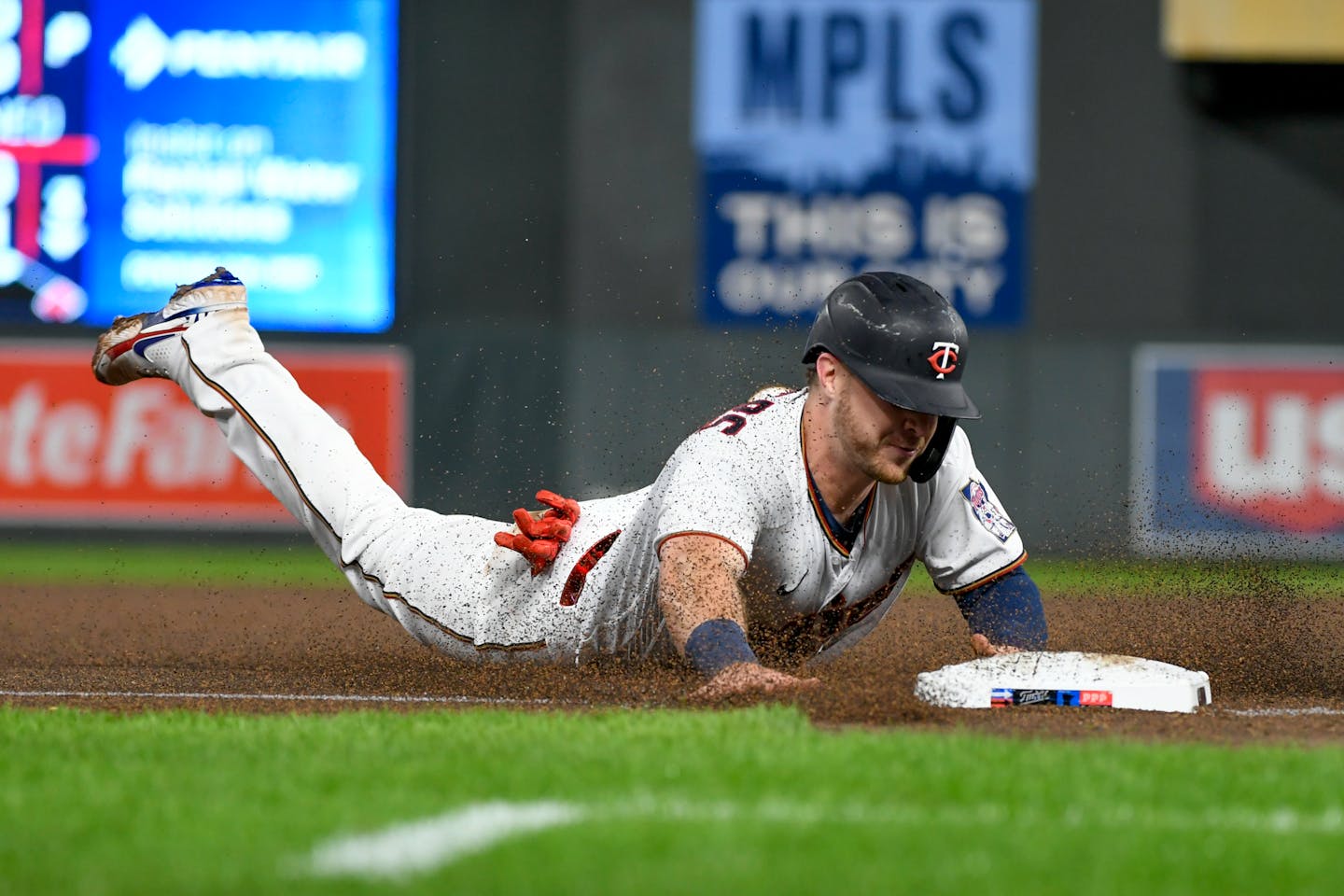 Ryan Jeffers reaches third base on a wild pitch by White Sox pitcher Kendall Graveman during the eighth inning