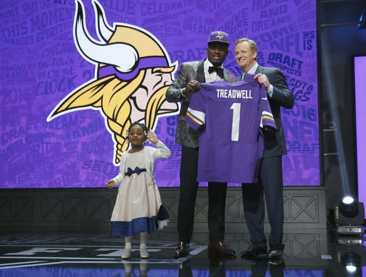 Mississippi's Laquon Treadwell posed with daughter Madison and NFL Commissioner Roger Goodell after the wide receiver was selected by the Vikings in the first round.